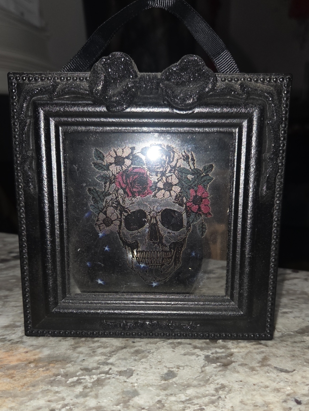 Black Decorative Skull Mirror Wall Accent with Floral Detail